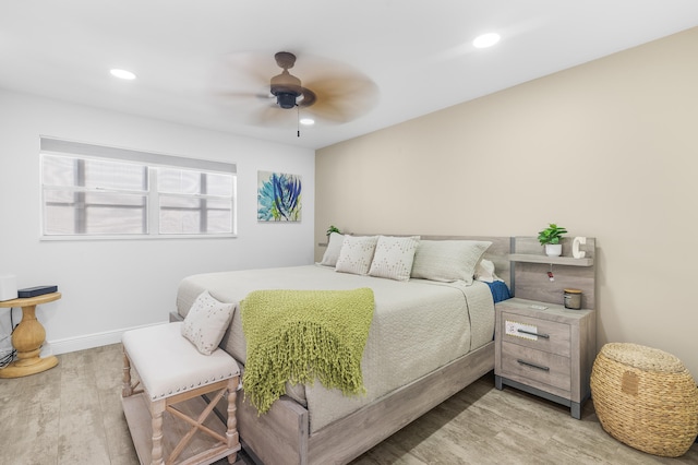 bedroom with baseboards, ceiling fan, wood finished floors, and recessed lighting