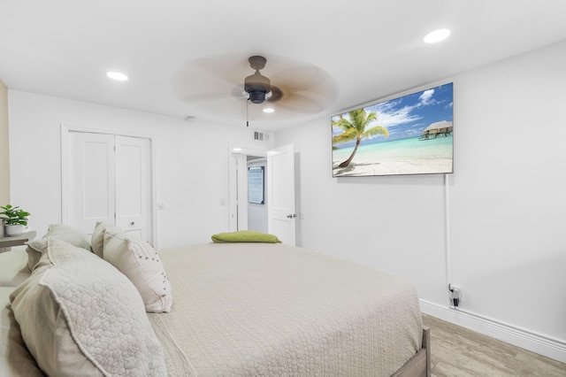 bedroom with ceiling fan, light wood-style flooring, recessed lighting, visible vents, and a closet