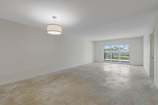 2871 N Ocean Blvd Unit C103, Boca Raton, FL 33431 - unfurnished room with concrete flooring