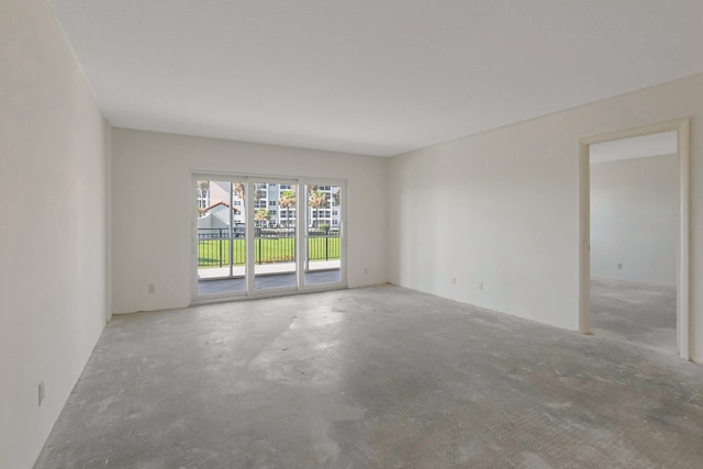 2871 N Ocean Blvd Unit C103, Boca Raton, FL 33431 - unfurnished room with unfinished concrete floors