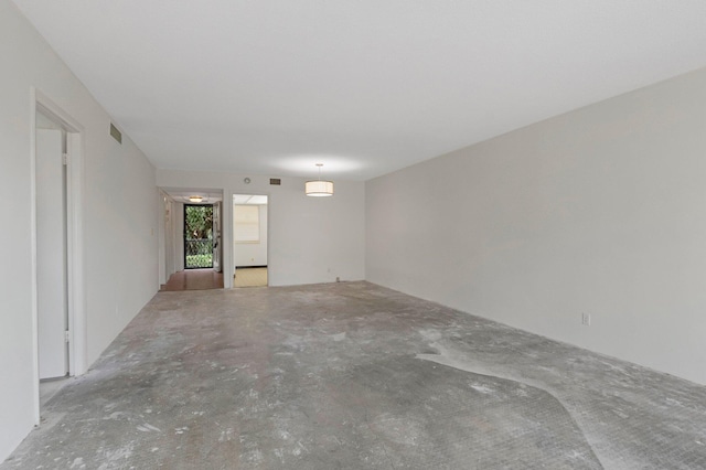 2871 N Ocean Blvd Unit C103, Boca Raton, FL 33431 - empty room with unfinished concrete flooring