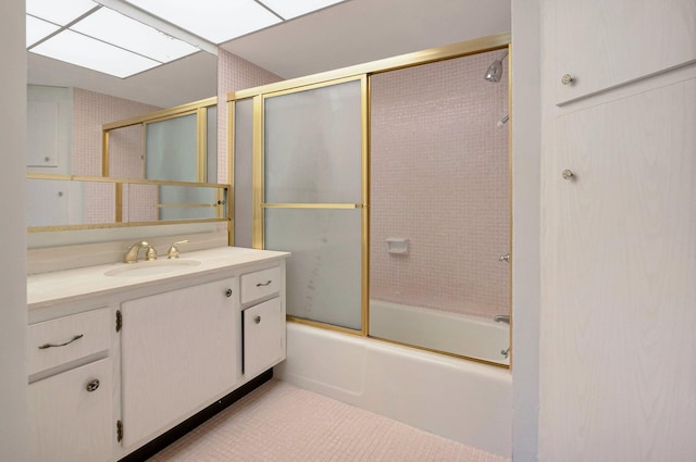 2871 N Ocean Blvd Unit C103, Boca Raton, FL 33431 - full bathroom with vanity, combined bath / shower with glass door, and tile patterned floors