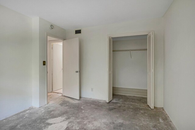 2871 N Ocean Blvd Unit C103, Boca Raton, FL 33431 - unfurnished bedroom featuring a closet