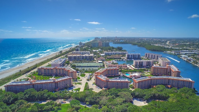 bird's eye view featuring a view of the beach and a water view