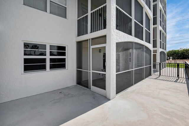 2871 N Ocean Blvd Unit C103, Boca Raton, FL 33431 - view of patio / terrace featuring fence