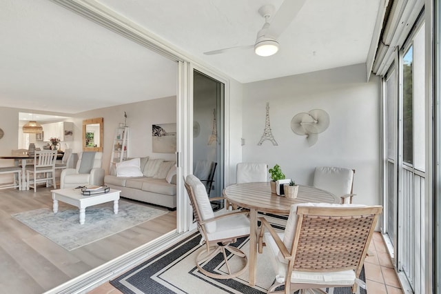 interior space with light hardwood / wood-style floors and ceiling fan