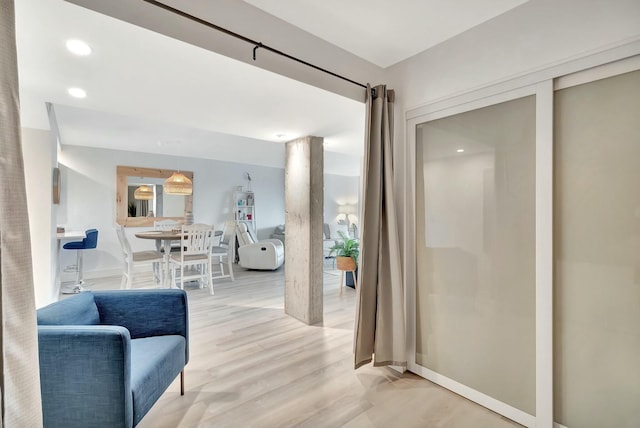 hall featuring light hardwood / wood-style floors