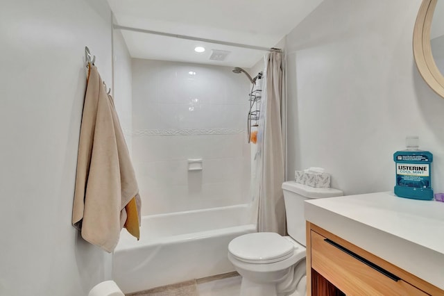 full bathroom with vanity, shower / bath combination with curtain, and toilet