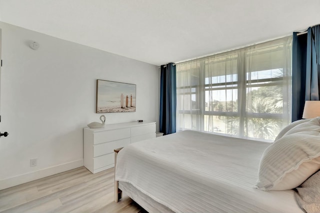 bedroom featuring light hardwood / wood-style floors