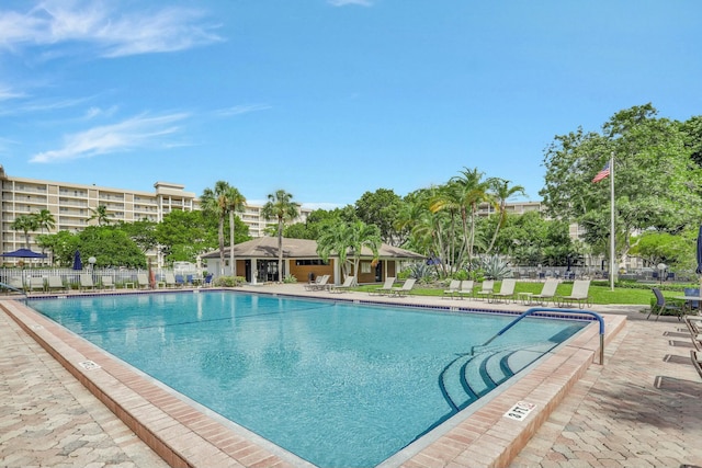 view of swimming pool with a patio area