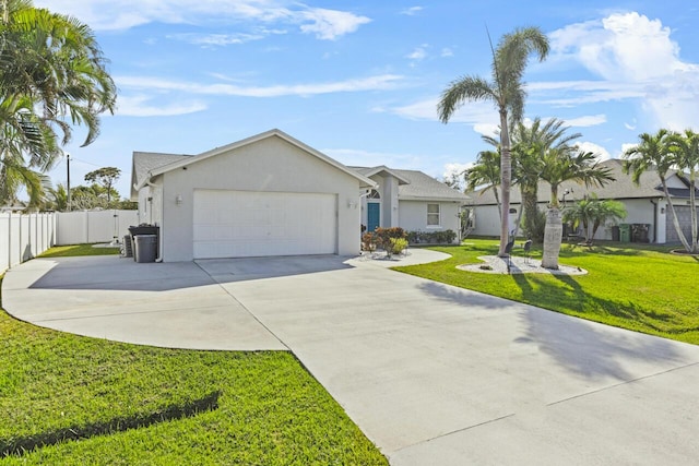 ranch-style house featuring a garage and a front lawn