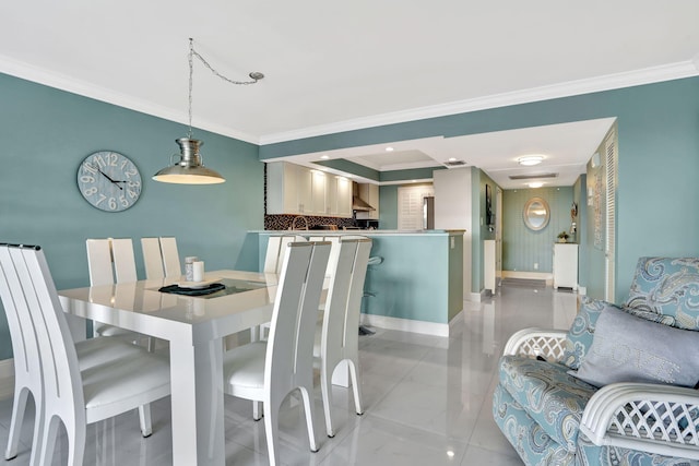 dining area with crown molding