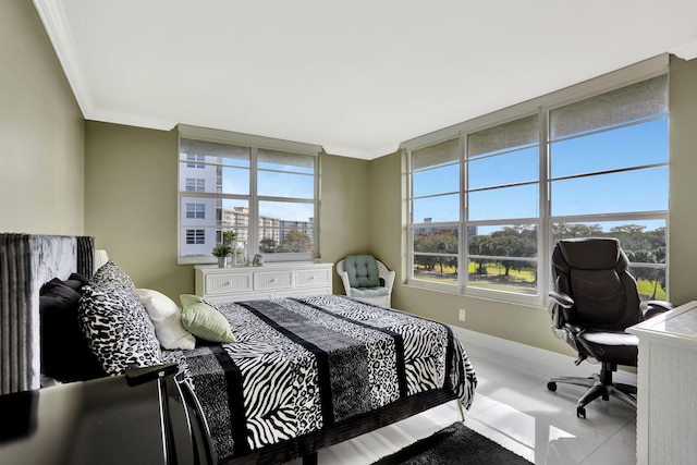 bedroom with ornamental molding