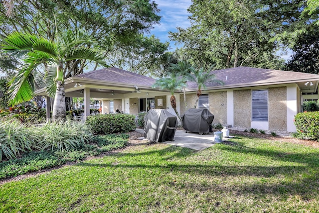 exterior space featuring a lawn and a patio