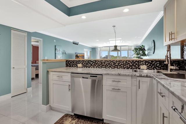 kitchen with sink, white cabinets, hanging light fixtures, stainless steel dishwasher, and crown molding