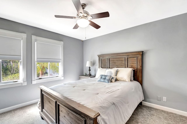 bedroom with light carpet and ceiling fan