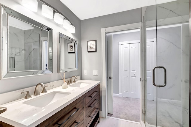 bathroom with vanity and walk in shower