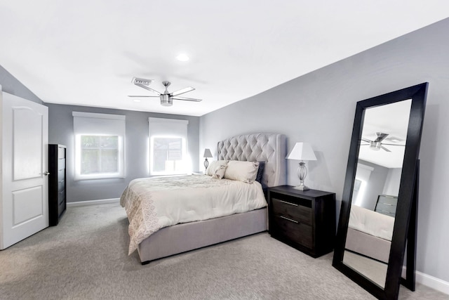 bedroom with light colored carpet and ceiling fan