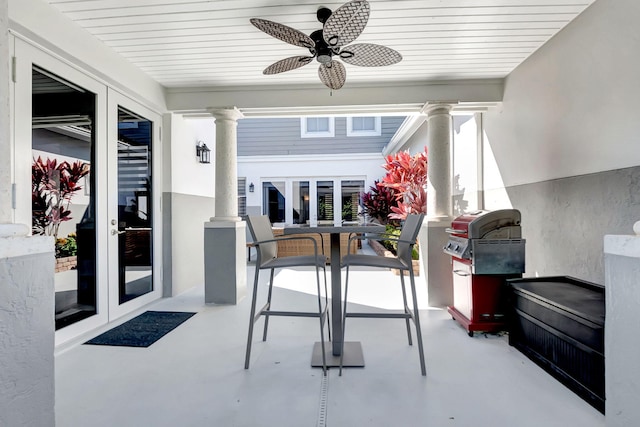 view of patio featuring area for grilling, french doors, and ceiling fan