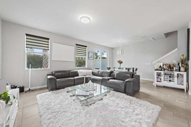 living room featuring a chandelier