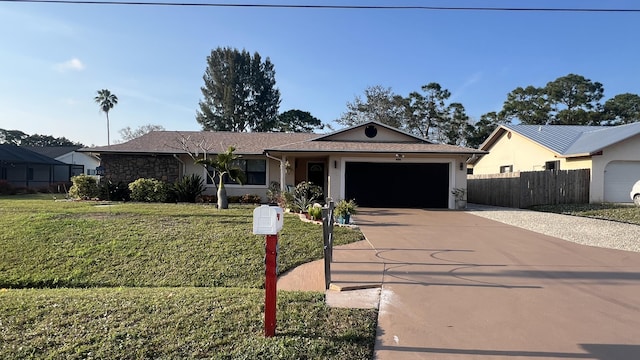 ranch-style house with a garage and a front lawn