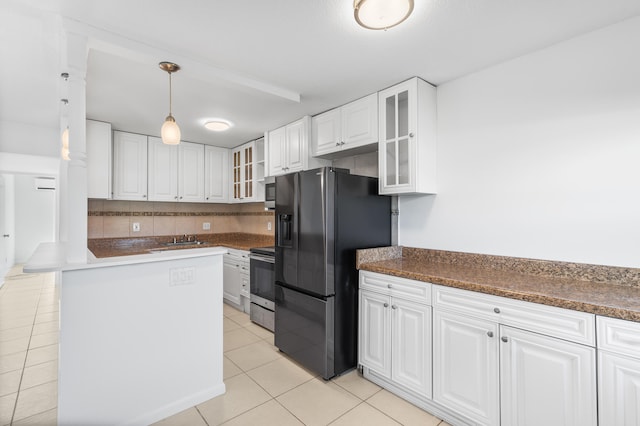 kitchen featuring hanging light fixtures, stainless steel range with electric cooktop, white cabinets, and black refrigerator with ice dispenser