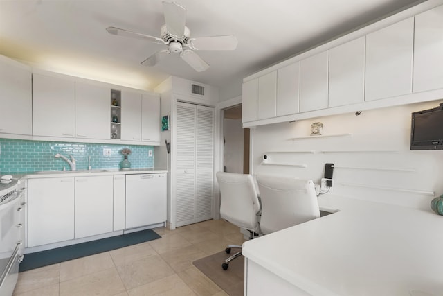 kitchen with sink, backsplash, white cabinets, ceiling fan, and white appliances