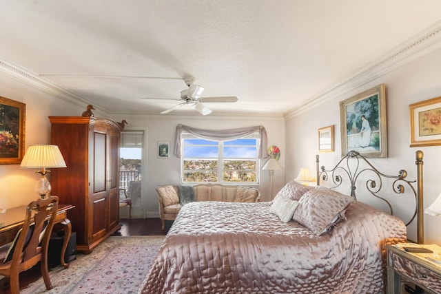 bedroom featuring crown molding, ceiling fan, and light hardwood / wood-style flooring