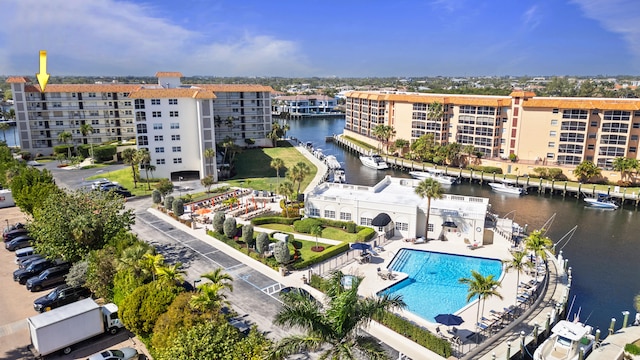 drone / aerial view featuring a water view