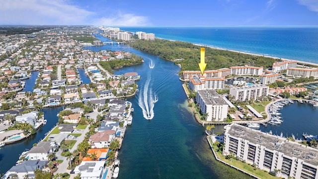 birds eye view of property featuring a water view