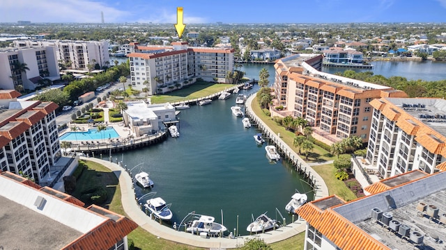 birds eye view of property with a water view