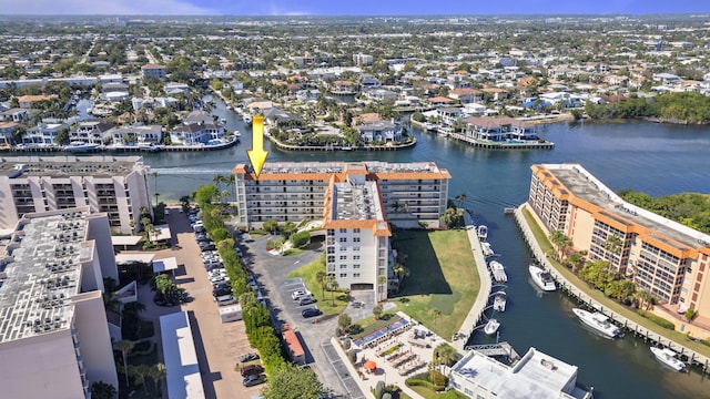 birds eye view of property featuring a water view