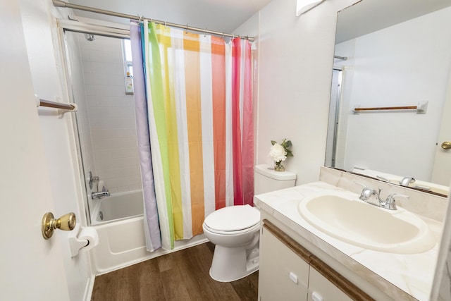 full bathroom with shower / bath combination with curtain, wood-type flooring, vanity, and toilet