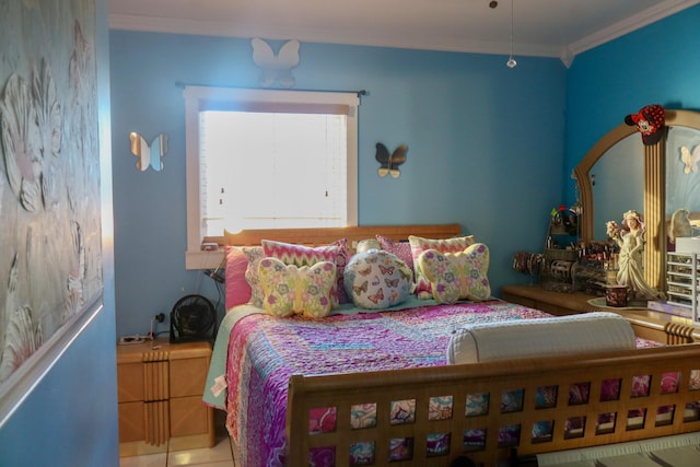 bedroom with crown molding