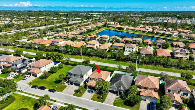 aerial view featuring a water view