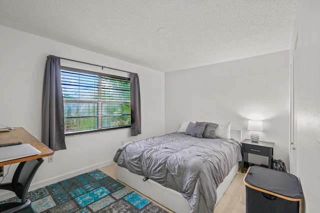 bedroom with a textured ceiling