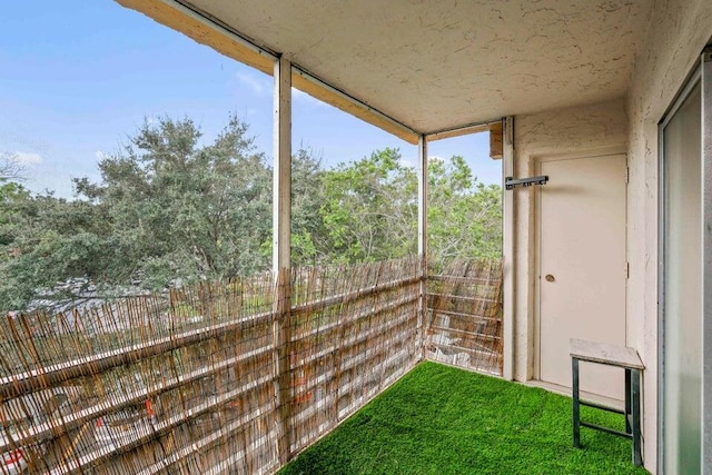 view of yard featuring a balcony