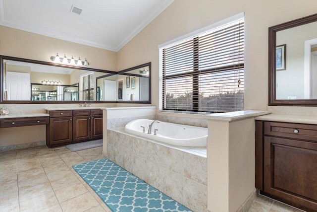 bathroom with a relaxing tiled tub, ornamental molding, tile patterned flooring, and vanity