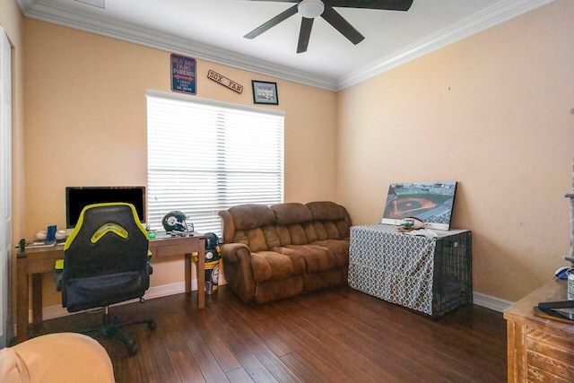 sitting room featuring ornamental molding, dark wood-type flooring, and ceiling fan