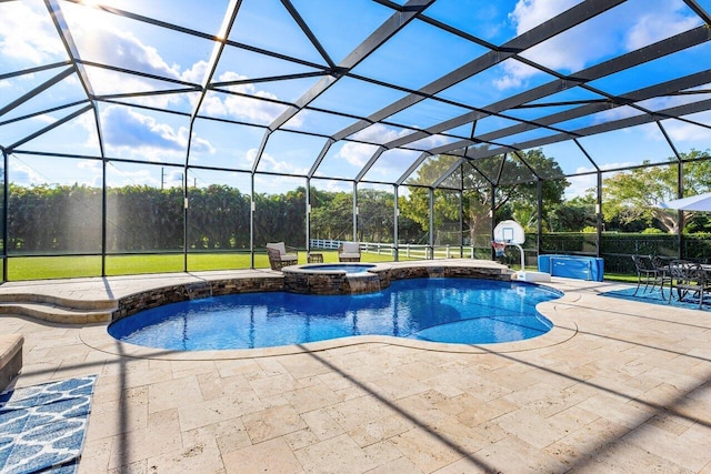 view of swimming pool featuring an in ground hot tub, glass enclosure, and a patio area