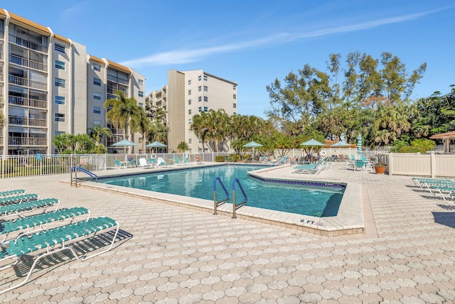 view of swimming pool featuring a patio