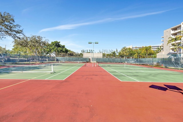 view of sport court with basketball hoop