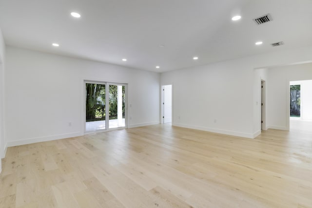 empty room with light wood-type flooring