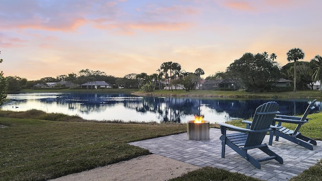 water view with a fire pit