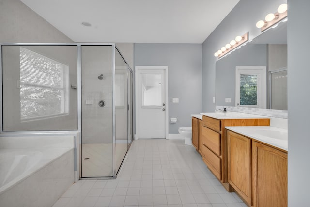 full bathroom with vanity, tile patterned flooring, independent shower and bath, and toilet