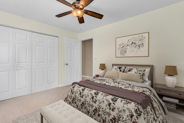 bedroom featuring carpet floors, a closet, and ceiling fan