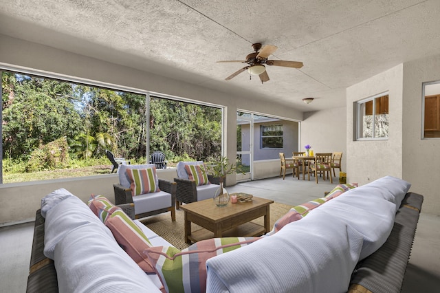 interior space featuring plenty of natural light and ceiling fan