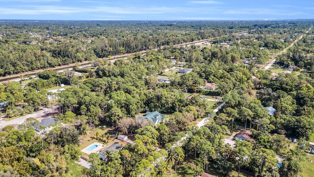 aerial view with a wooded view