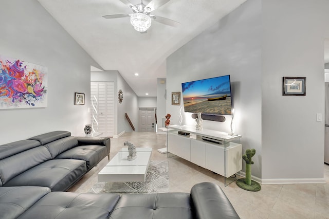 tiled living room with high vaulted ceiling and ceiling fan