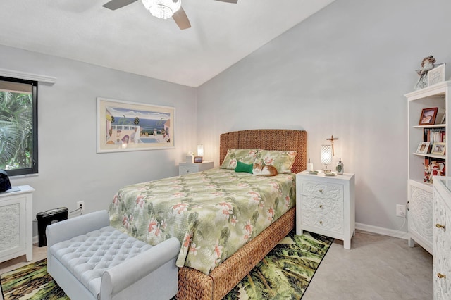 bedroom featuring lofted ceiling and ceiling fan